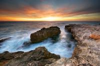 Вид на закат с камней